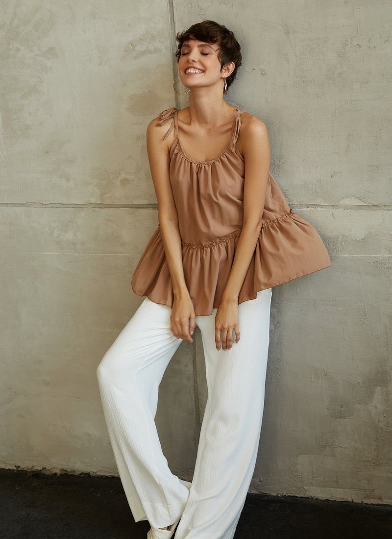 Beige blouse with ties