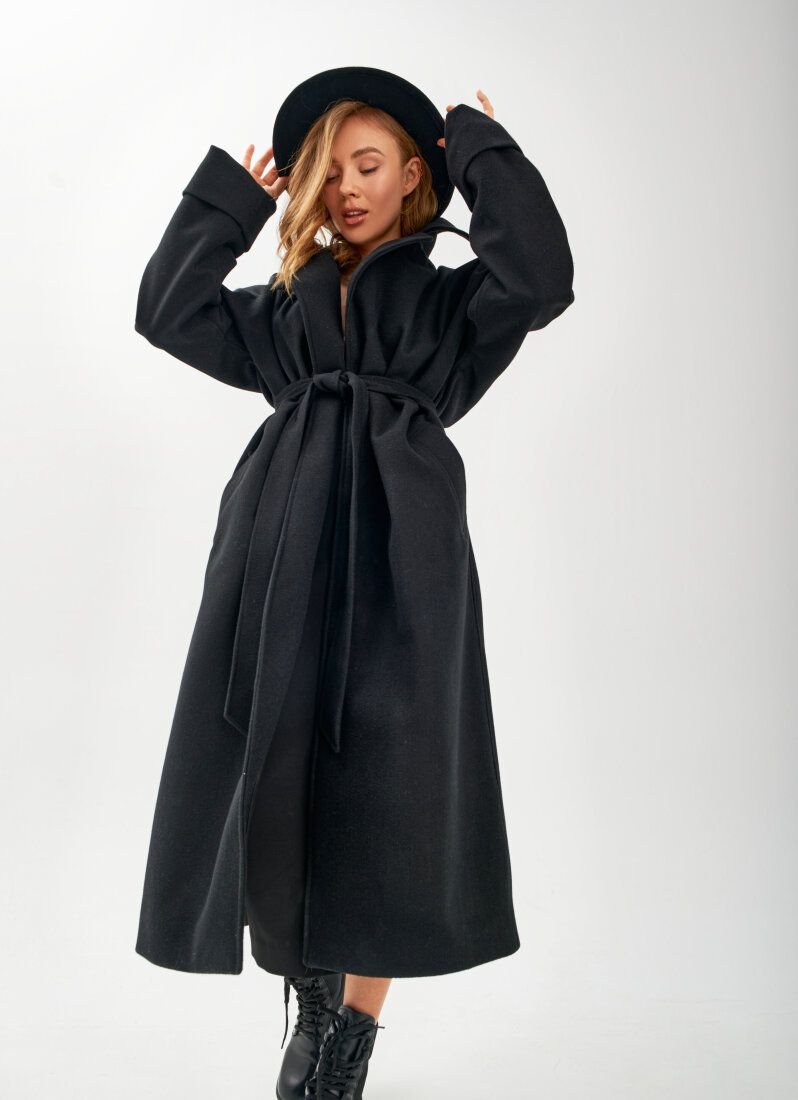 Black elongated coat