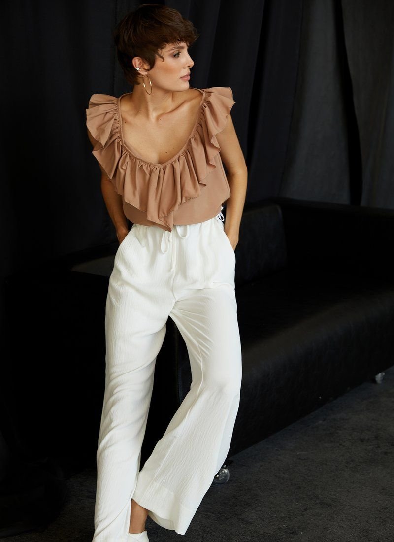 Blouse with flounces