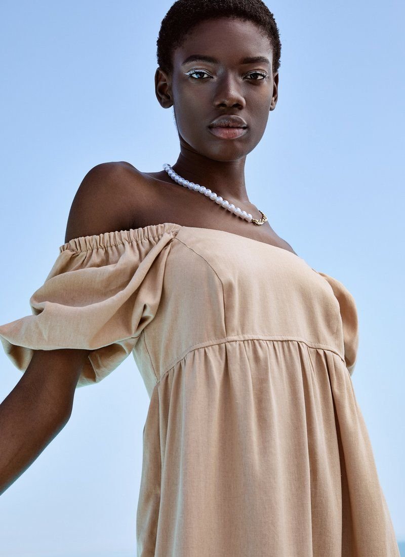 Beige dress made of soft fabric