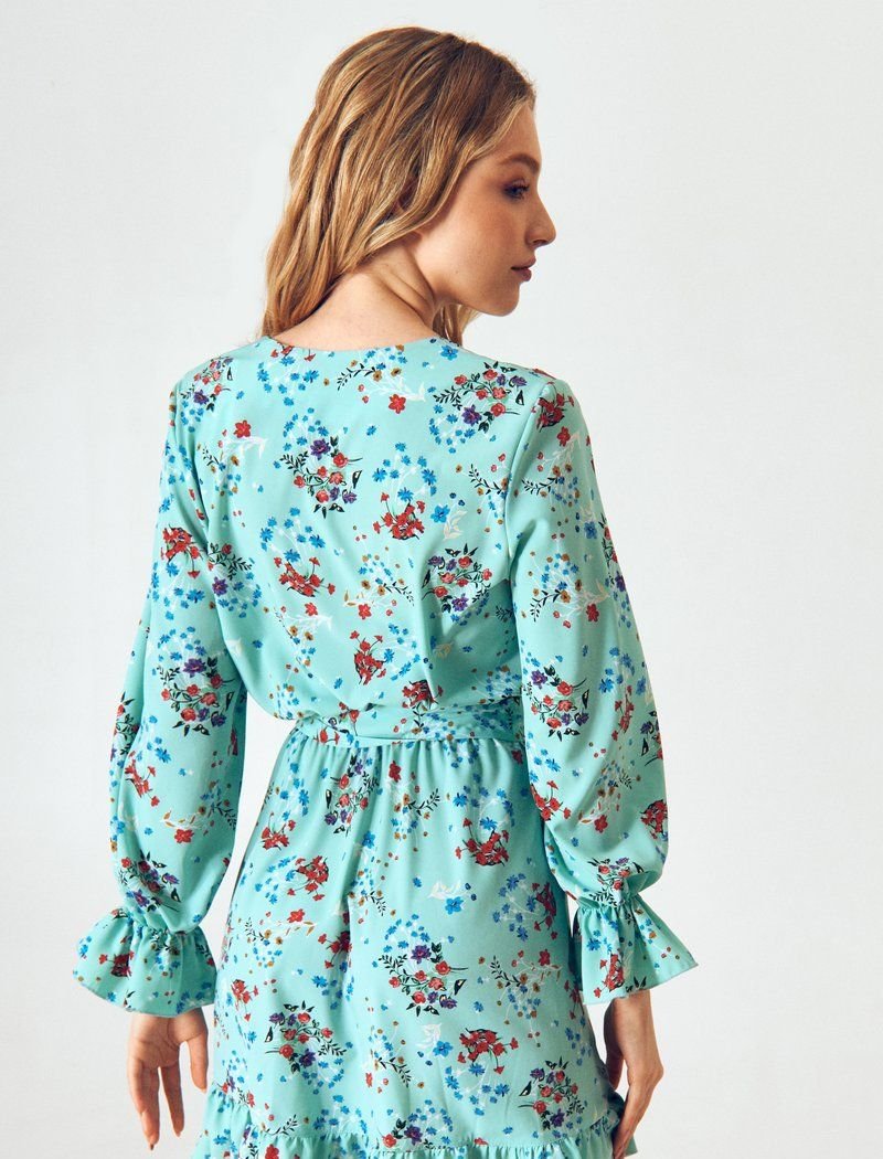 Feminine mini dress in mint shade