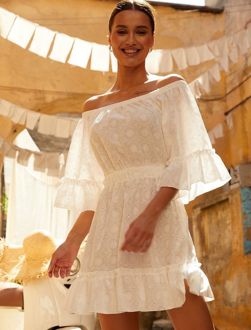 White dress with flounces