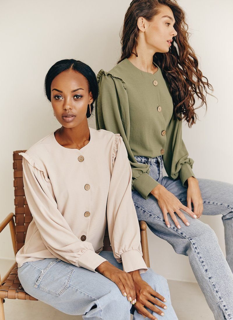 Beige blouse with buttons