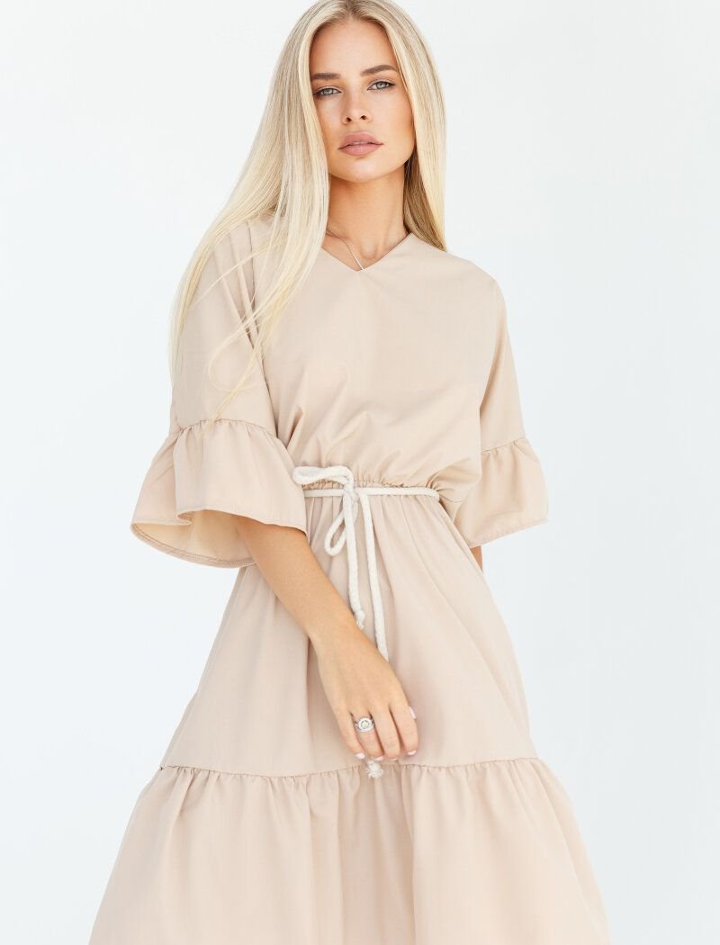 Romantic beige dress with flounces