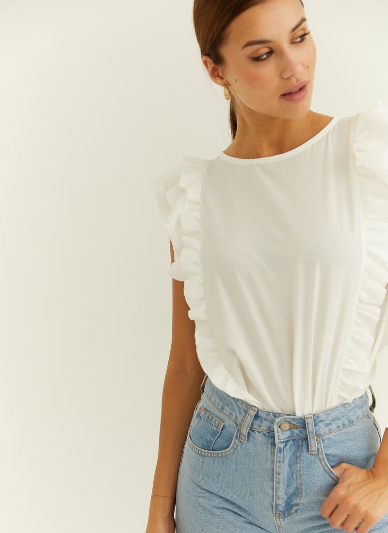 White blouse with ruffles