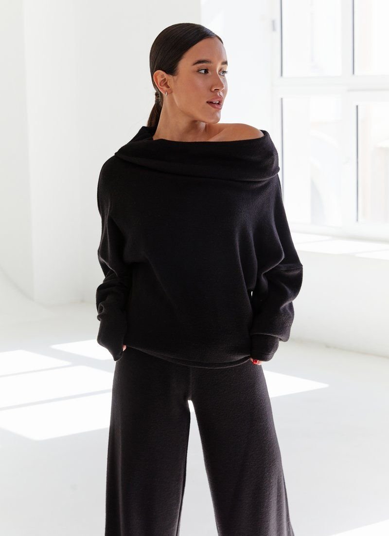 Black knitted suit with wide trousers