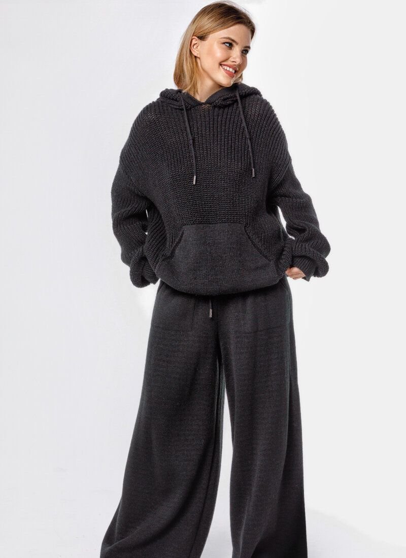 Black suit with a loose fit