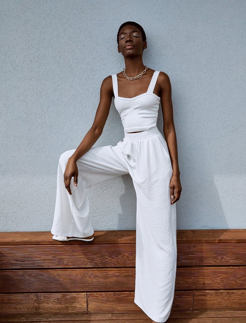 Wide white trousers