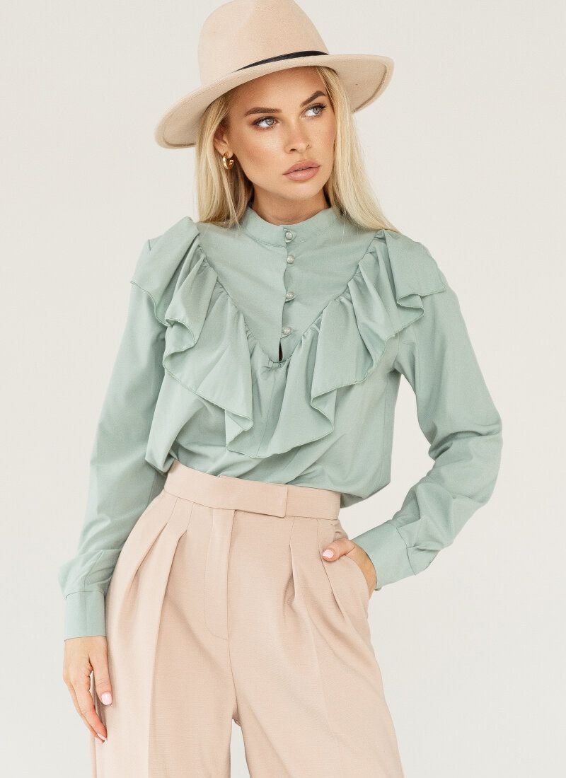 Blouse with a mint-colored flounce