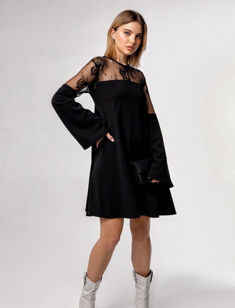 Loose dress with an openwork yoke