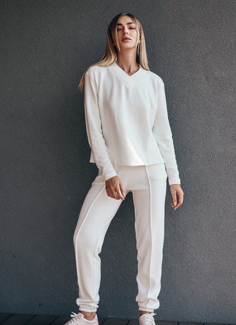 White suit with raised seams