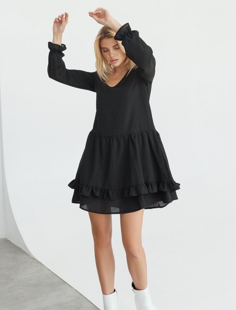 Loose black dress with a double-layered skirt