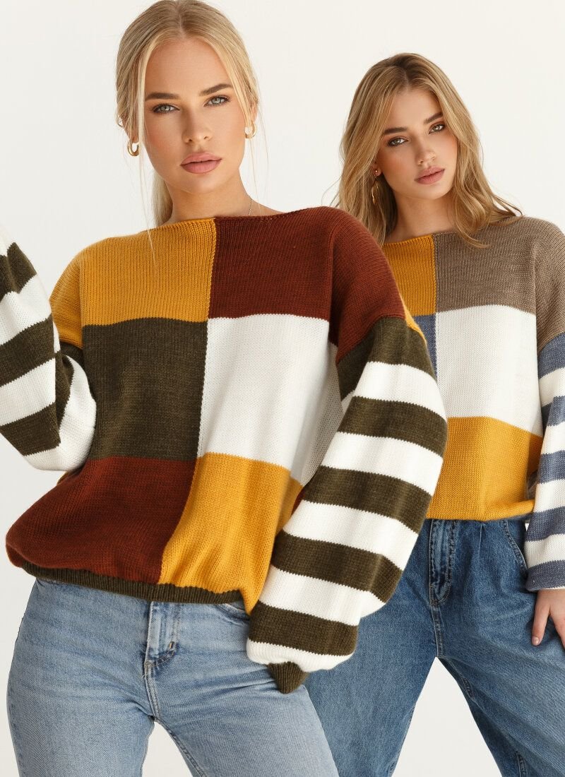 A loose jumper in the color block style