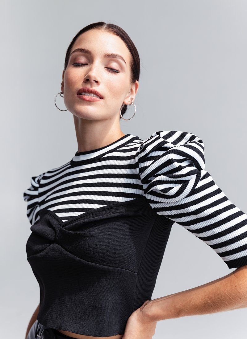 Knitted top with corset