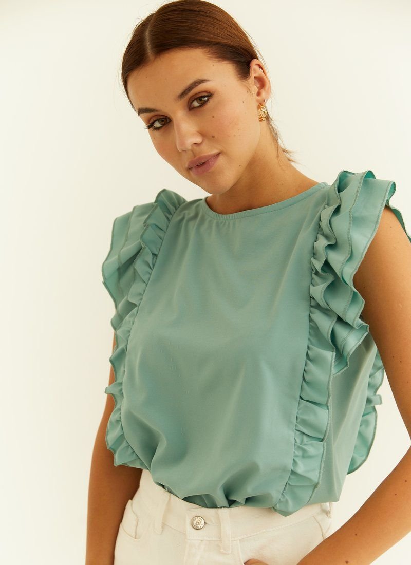 Mint blouse with ruffles