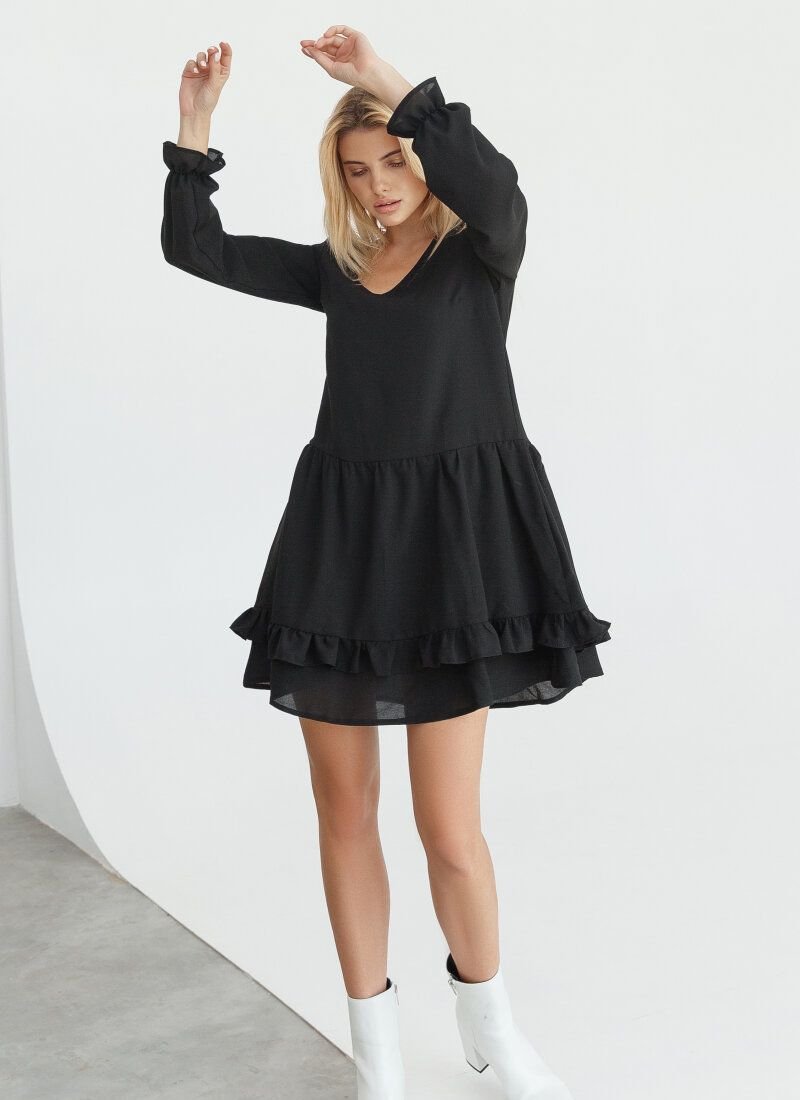 Loose black dress with a two-layer skirt