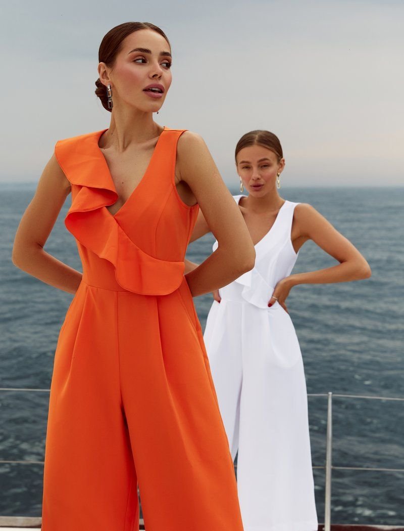 Bright jumpsuit with a flounce