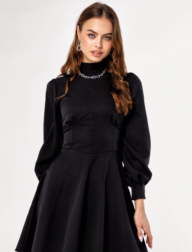 Black dress with a curly yoke