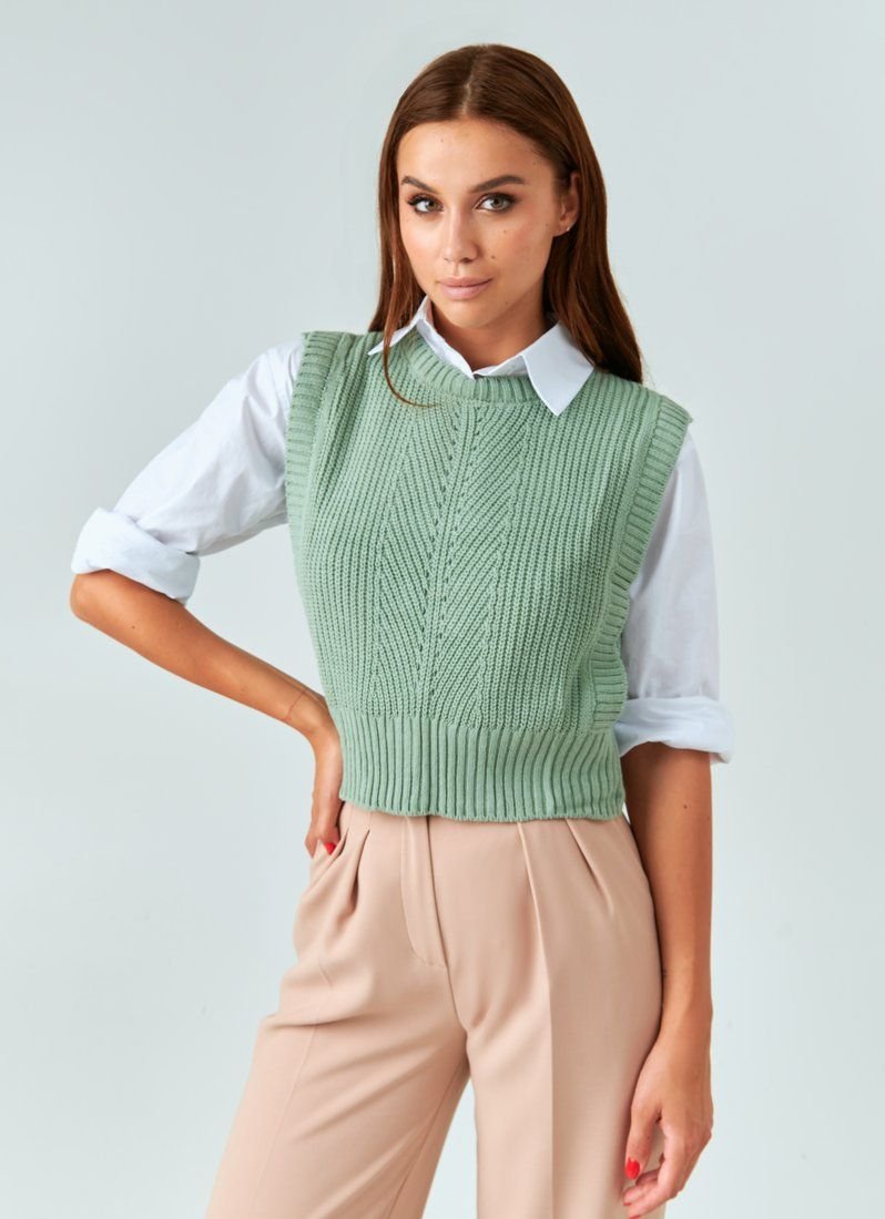 Knitted vest of pistachio color