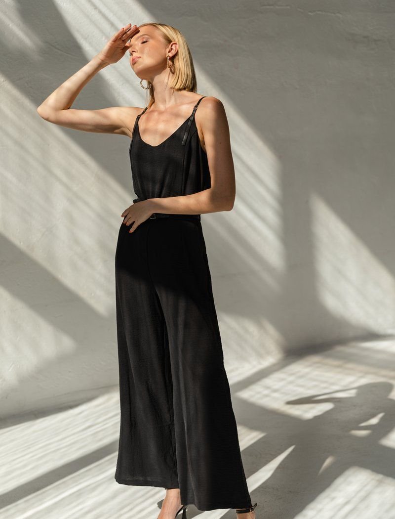 Black jumpsuit with a belt