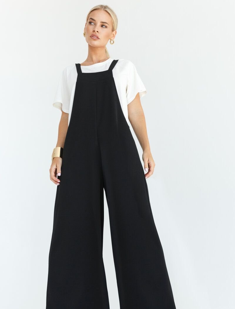 Loose black jumpsuit with a square neckline