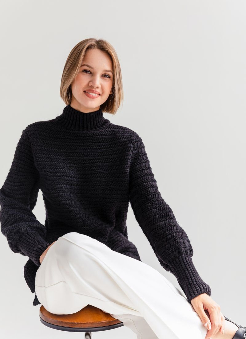 Elongated black sweater