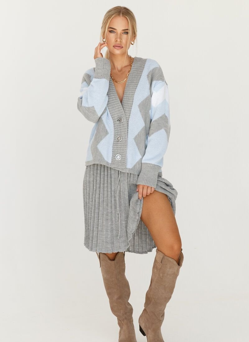 Heavenly suit with pleated skirt