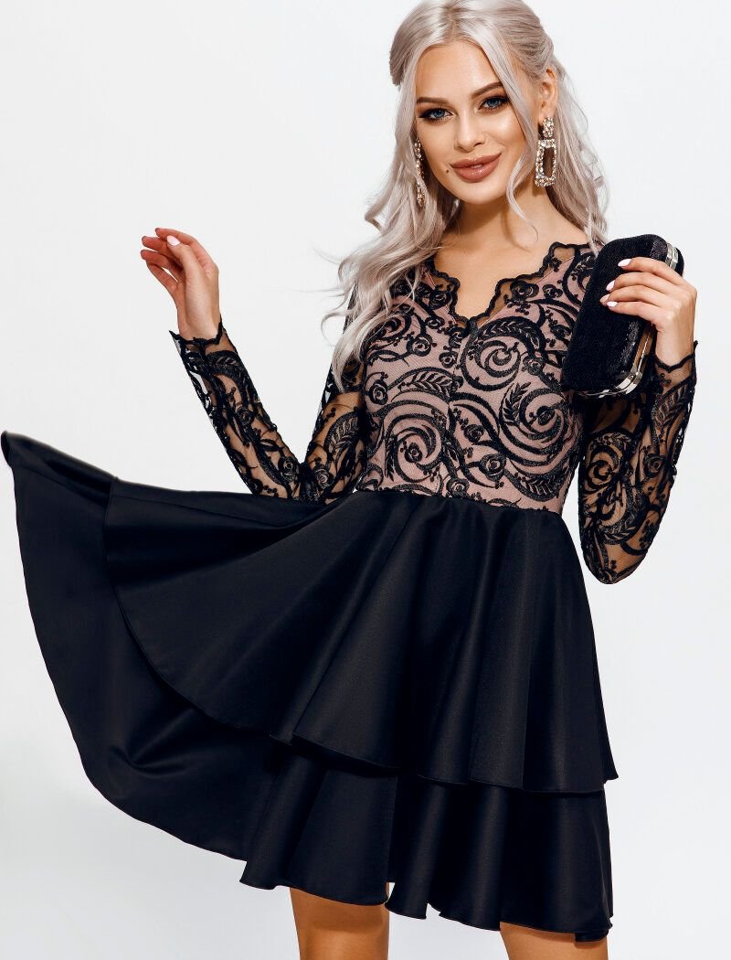 the back of a dress with contrasting lace