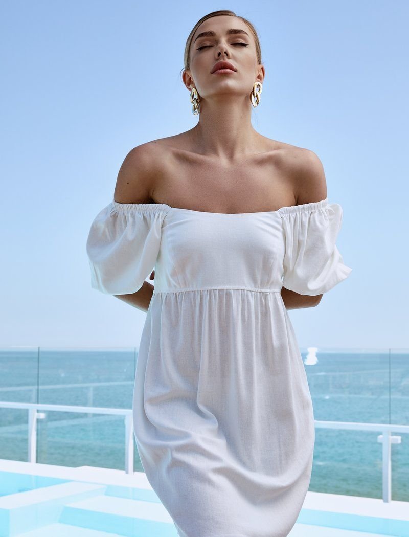 Laconic white dress
