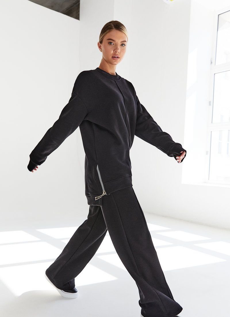 Black suit with a voluminous sweatshirt