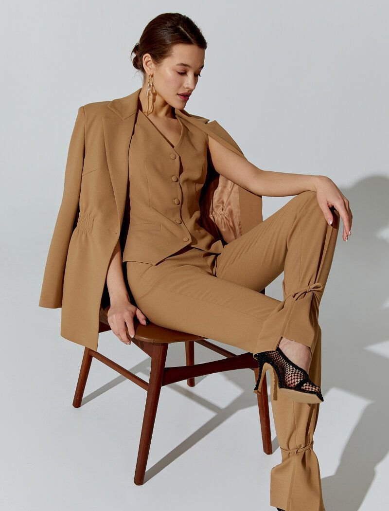 Beige jacket with an original cut