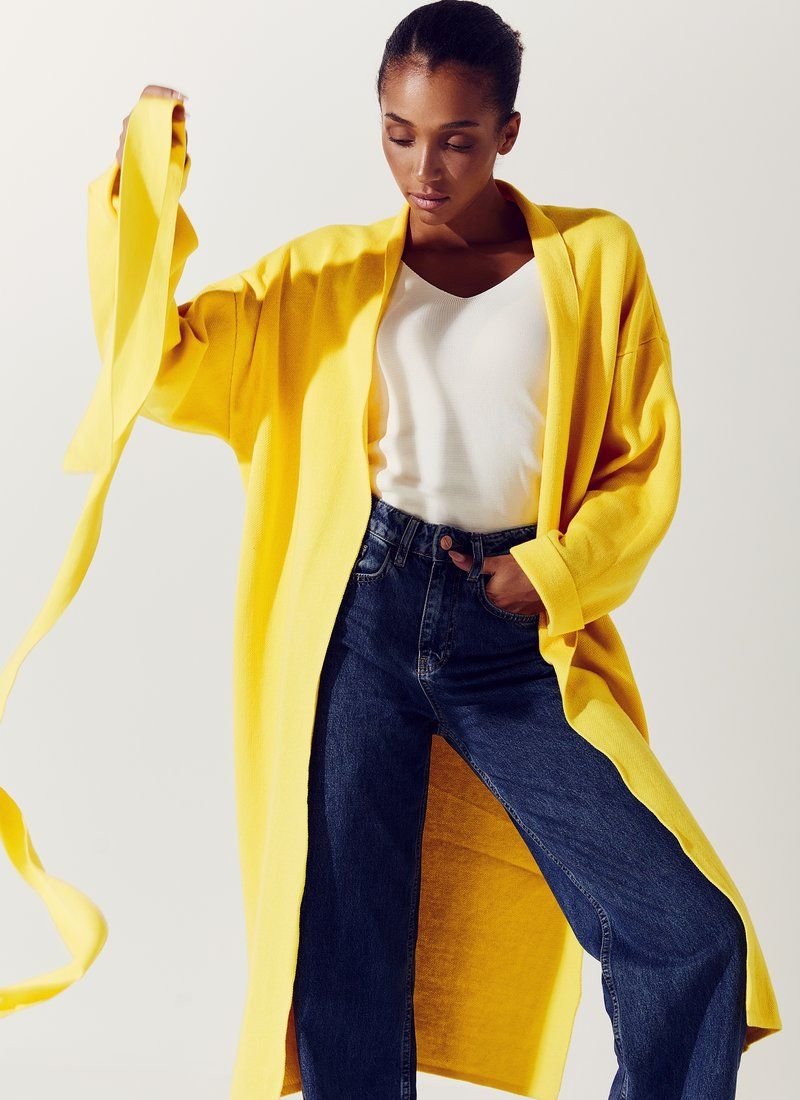 Bright yellow cardigan