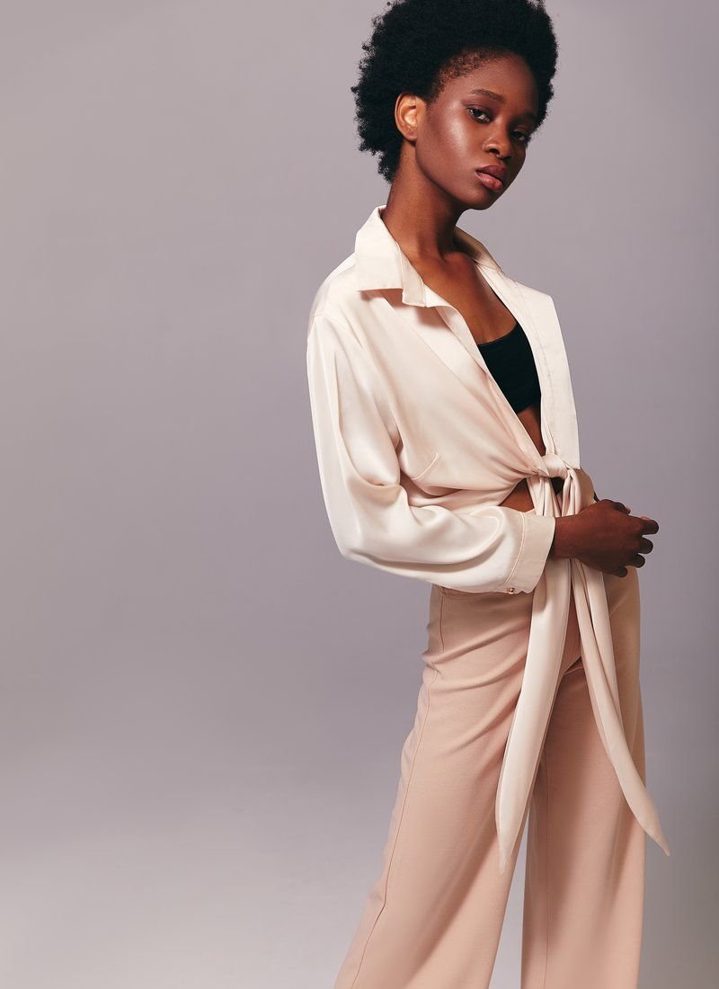 Beige blouse with ties