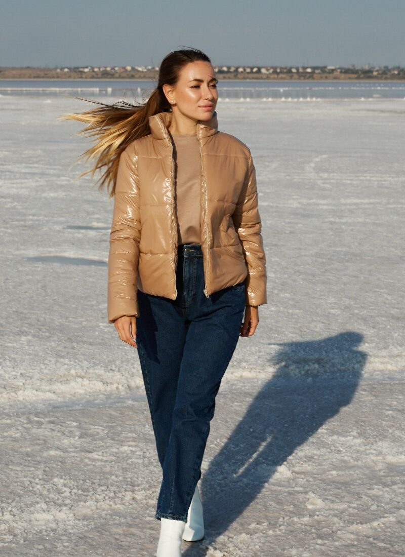 Beige jacket made of glossy material