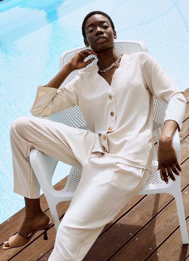 Beige suit made of lightweight material