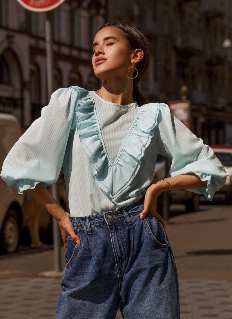 Blouse with voluminous sleeves