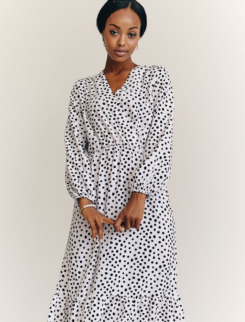 White dress with polka dots