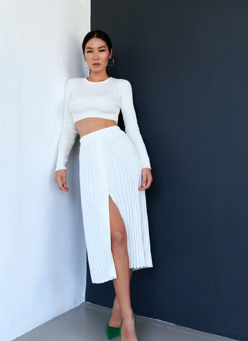 Knitted suit with midi skirt