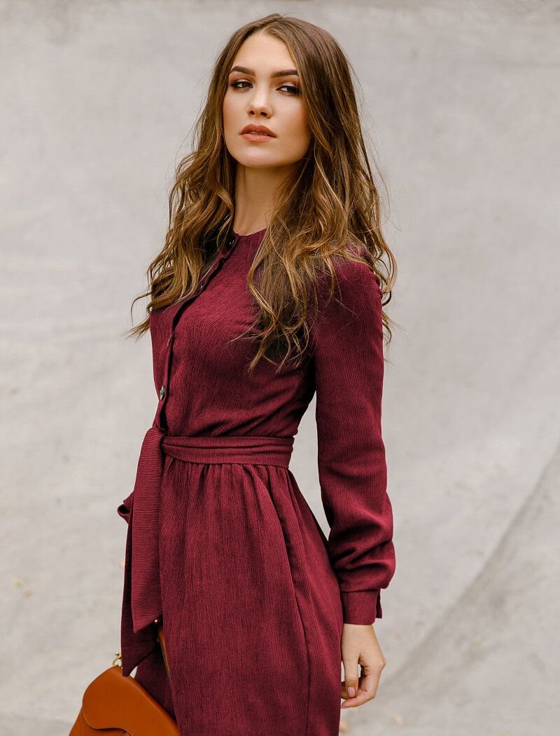 A dress of a restrained cut