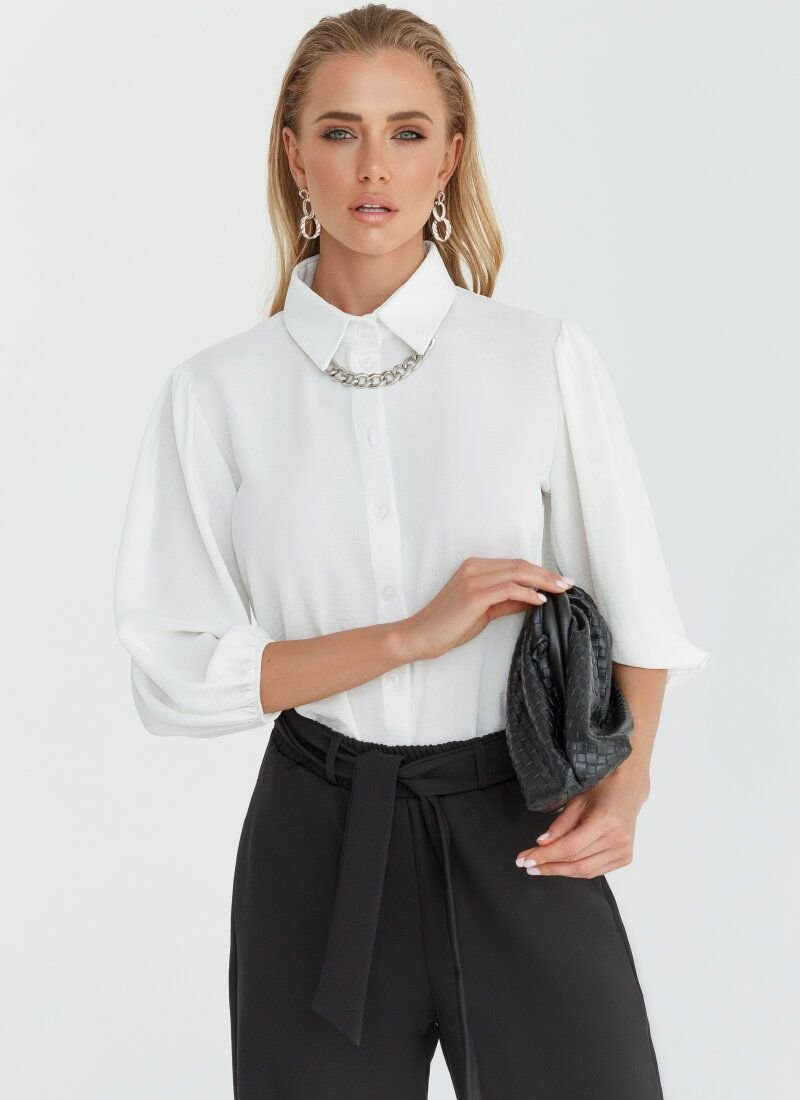 Laconic shirt of milk color