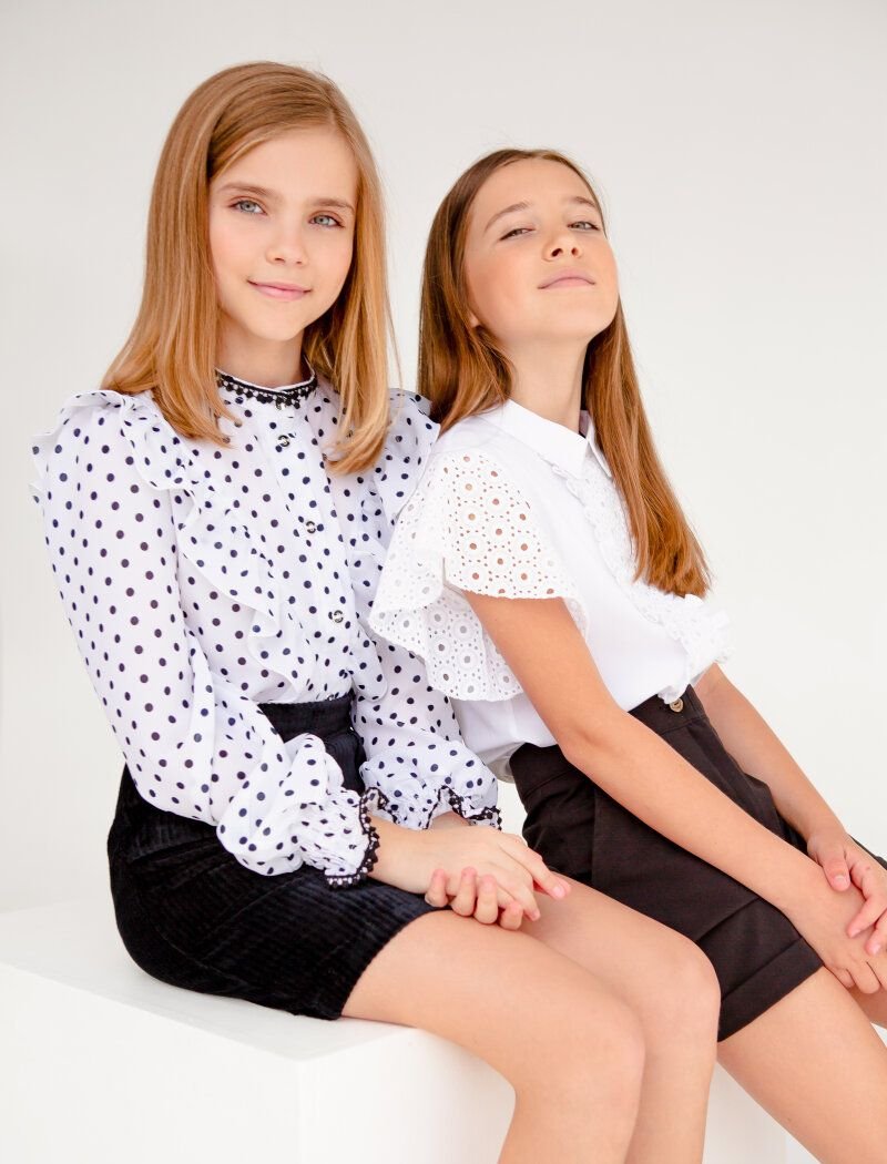 Elegant school blouse with polka dots