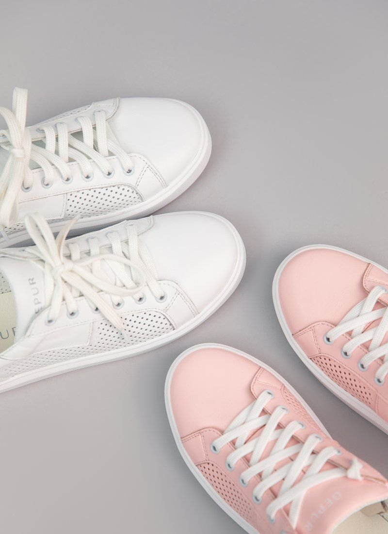 White sneakers with perforation made of genuine leather