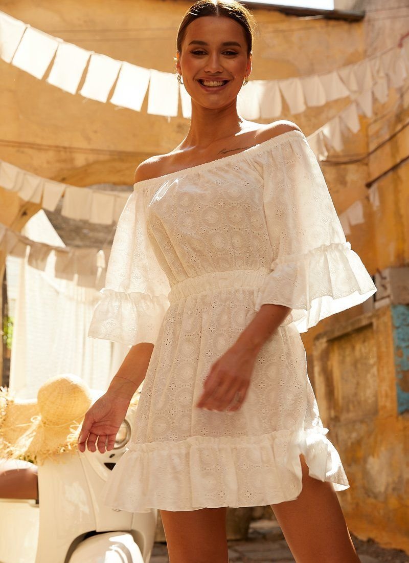 White dress with flounces