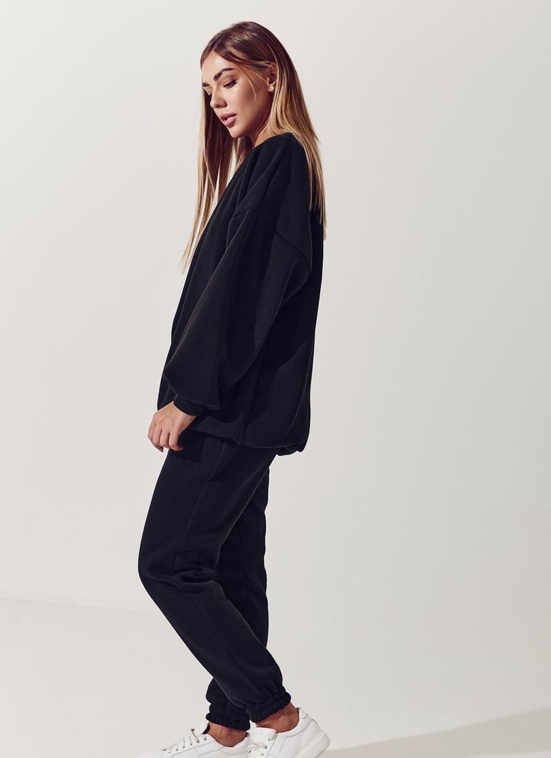 Black suit with an elongated sweatshirt